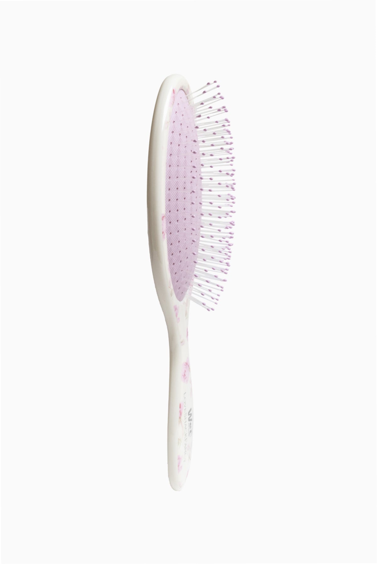 Ribbon Rosa detangling hair brush with white handle and pink floral bristles