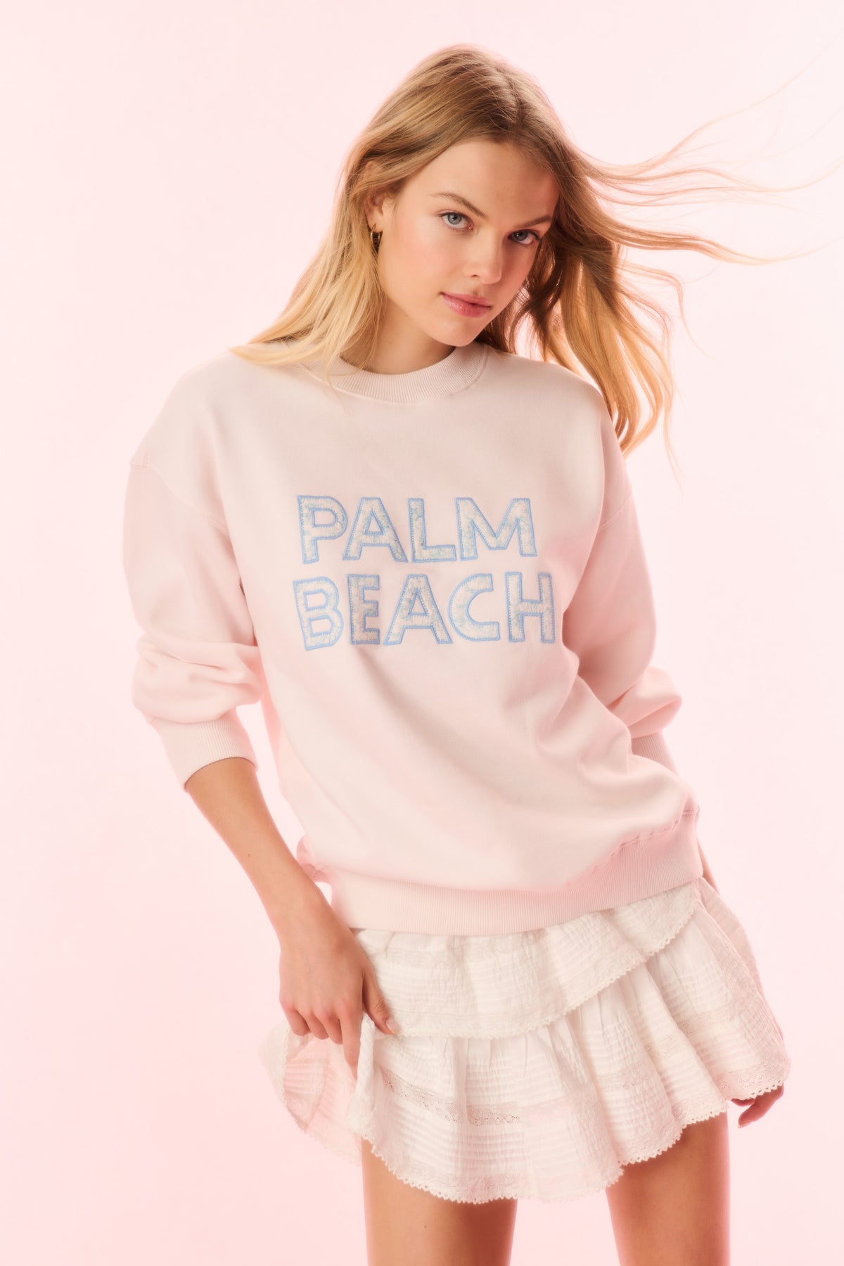 Cream pullover sweatshirt with 'PALM BEACH' graphic across chest (front)