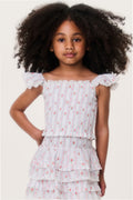 Girls white cherry-print peplum top with ruffled cap sleeves, front view