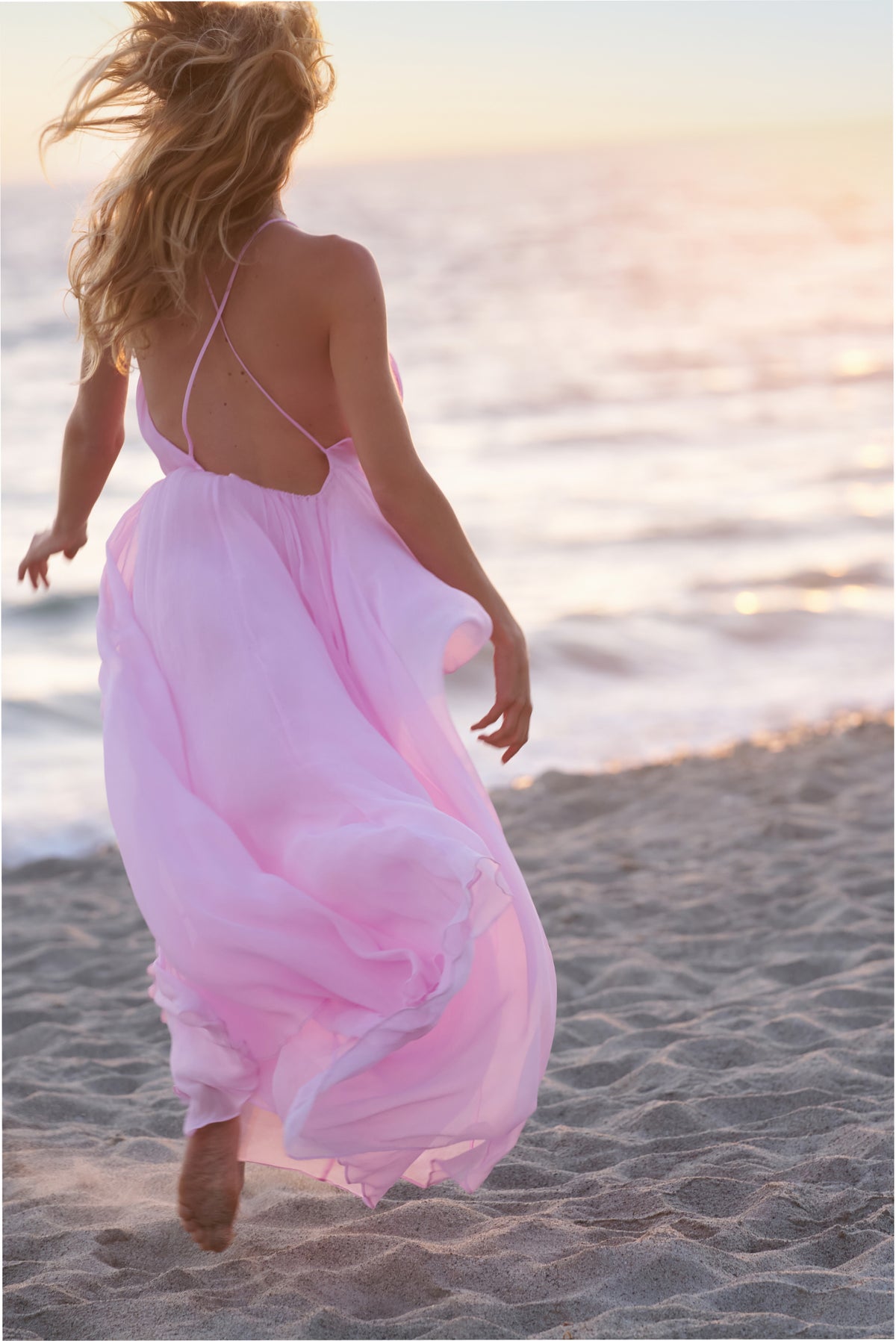 Light pink chiffon maxi dress with open back and thin spaghetti straps