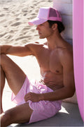 Pink patterned trucker cap shown in side profile