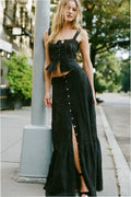 Black cotton maxi skirt with front buttons and long side slit