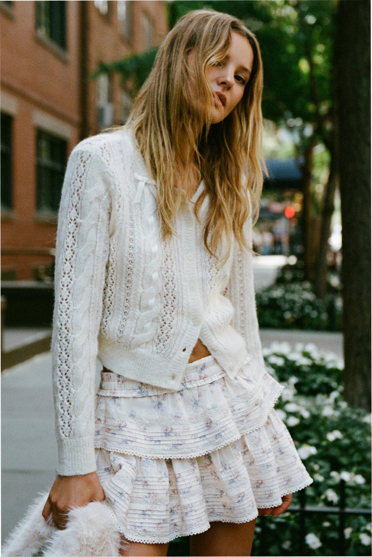 Floral tiered mini skirt with ruffled hem and delicate lace trim