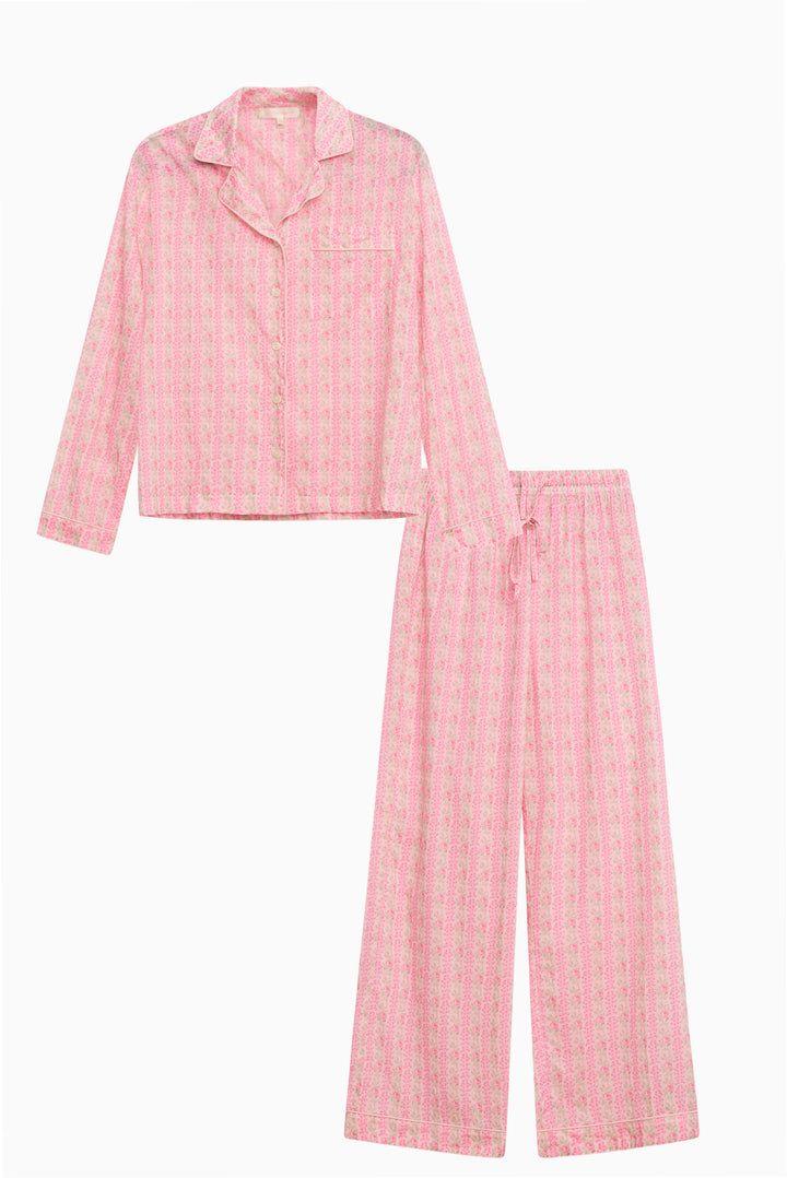 Pink cotton pajama set flat lay: button shirt with collar and wide-leg pants, small print