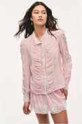 Pink silk lace blouse with lace paneling and long sleeves, lace-trim hem detail