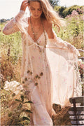 Sheer floral silk duster with lace trim, ruffled cuffs, and flowing sleeves