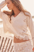 Ivory wool sweater with lace trim and floral lace appliquΓ©