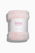 Petal pink plush blanket roll with LoveBlankets label and LoveShackFancy logo