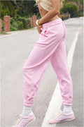Pink ditsy floral sweatpants with elastic cuffs