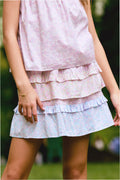 Ruffled tween skirt with pink and light blue tiers, elastic waistband, close-up