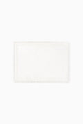 Victorian place mats in white, rectangular with ornate lace border