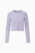 Light lavender pointelle cardigan, long sleeves and button front, flat lay