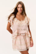 Petal peach silk mini skirt with tiered layers and scalloped lace trim