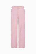 Pink straight-leg pants with tie waist and tassel drawstrings