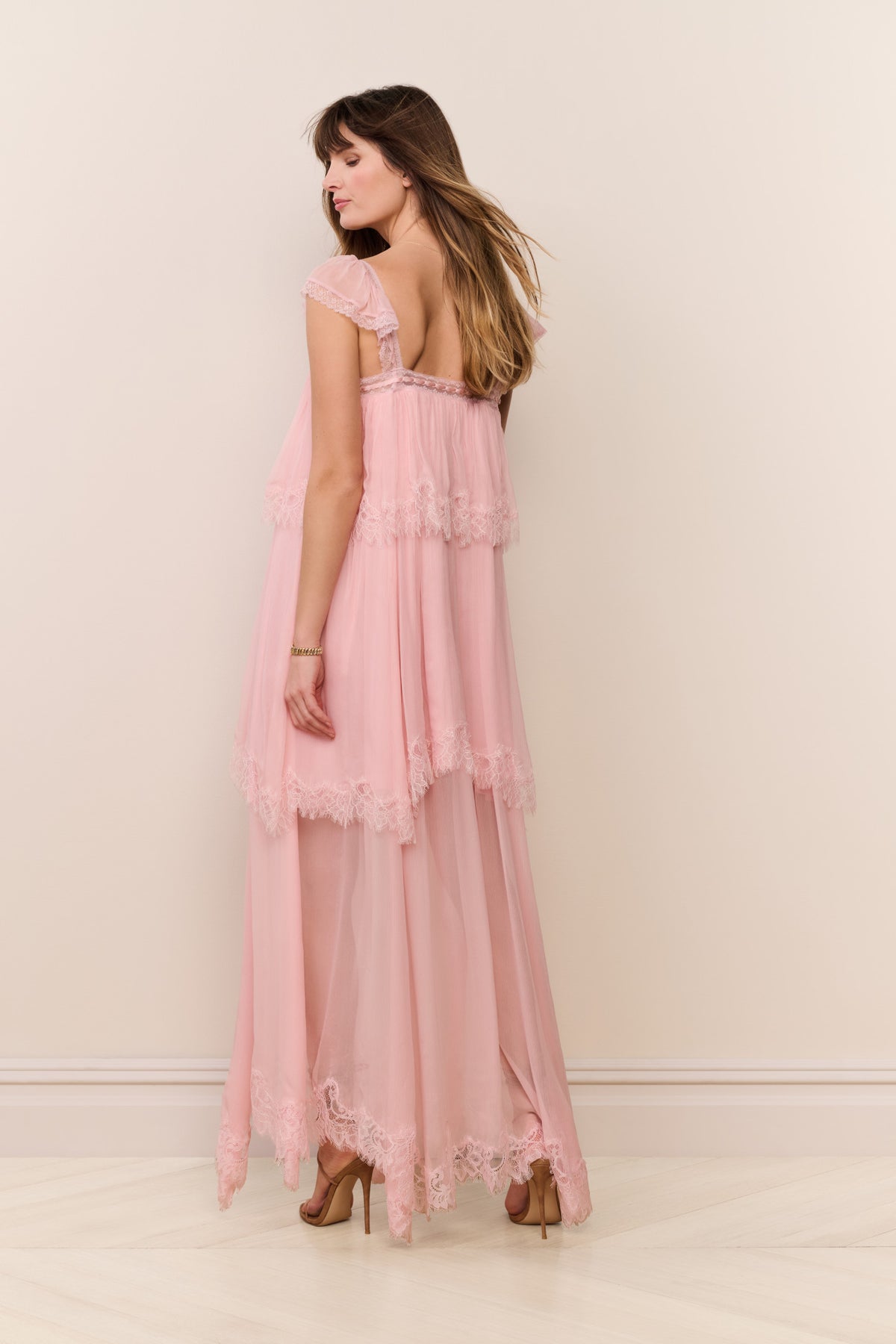 Pink silk chiffon maxi dress with lace trim, back view
