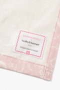 Brand label on pink apron hem: LoveShackFancy Hedley & Bennett &