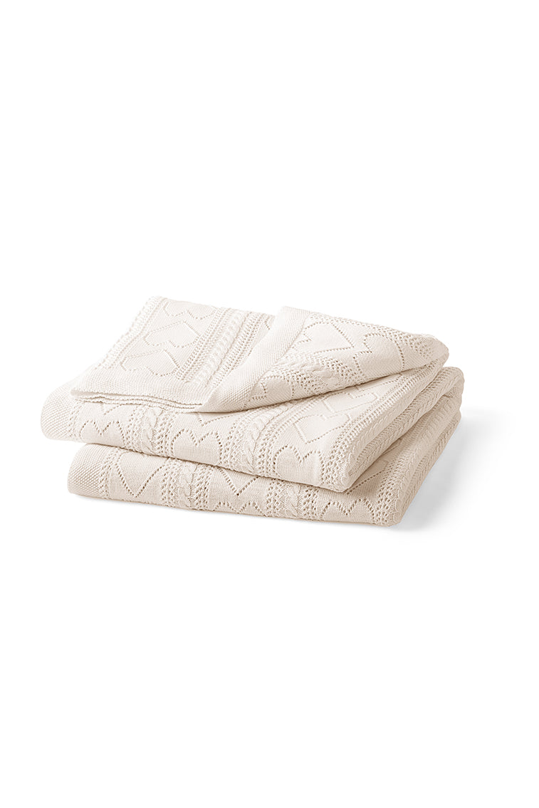 Ivory pointelle throw blanket with diamond knit panels