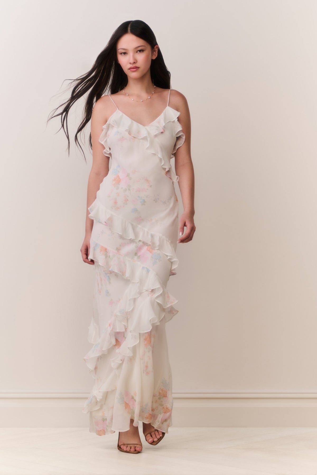 Floral print maxi dress with layered ruffles and spaghetti straps