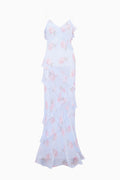 Blue ruffled dress with floral pattern on a white background