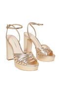 Pair of champagne platform sandals with braided straps, open toe, block heel