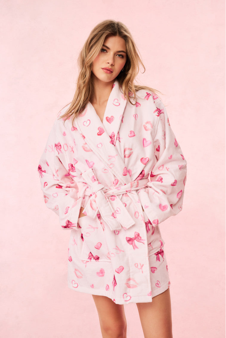 Light pink cotton bath robe with pink hearts, V-neck, and tied belt