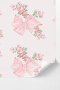Peel-and-stick wallpaper with pink floral bows and rose bouquets on light background