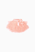 Pale pink tiered tulle skirt with satin bow at waistband, full gathered silhouette