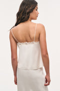 Alabaster crepe lace cami with spaghetti straps and scalloped lace back neckline.