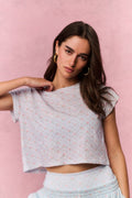 Light gray cropped tee with small scatter print and crew neck, front view