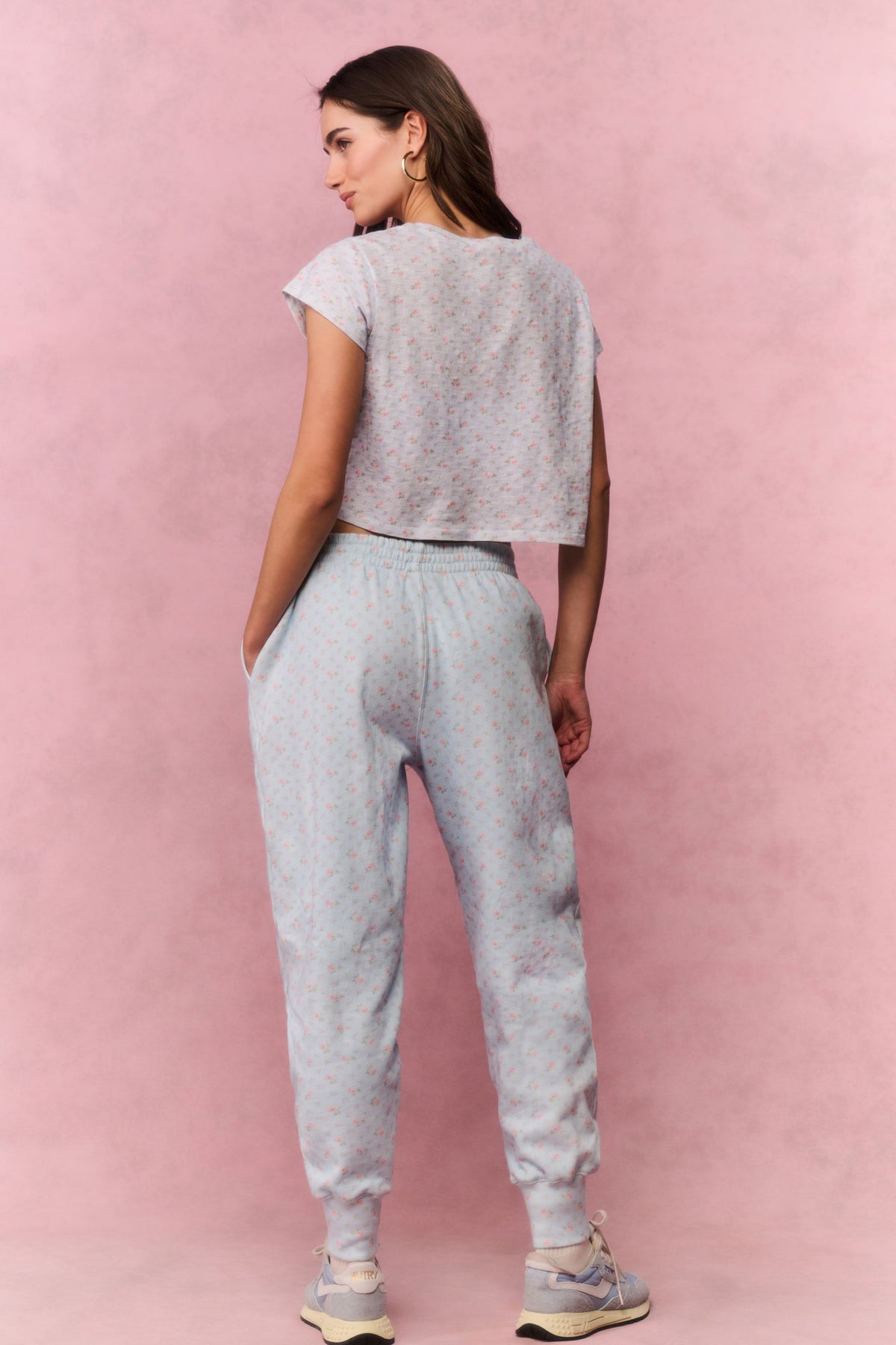 Light blue printed cotton sweatpants with elastic cuffs and relaxed tapered legs