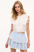 Chambray blue cotton ruffle mini skirt with layered tiers and scalloped edge