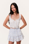 Blue printed ruffle mini skirt with layered tiers and elastic waistband