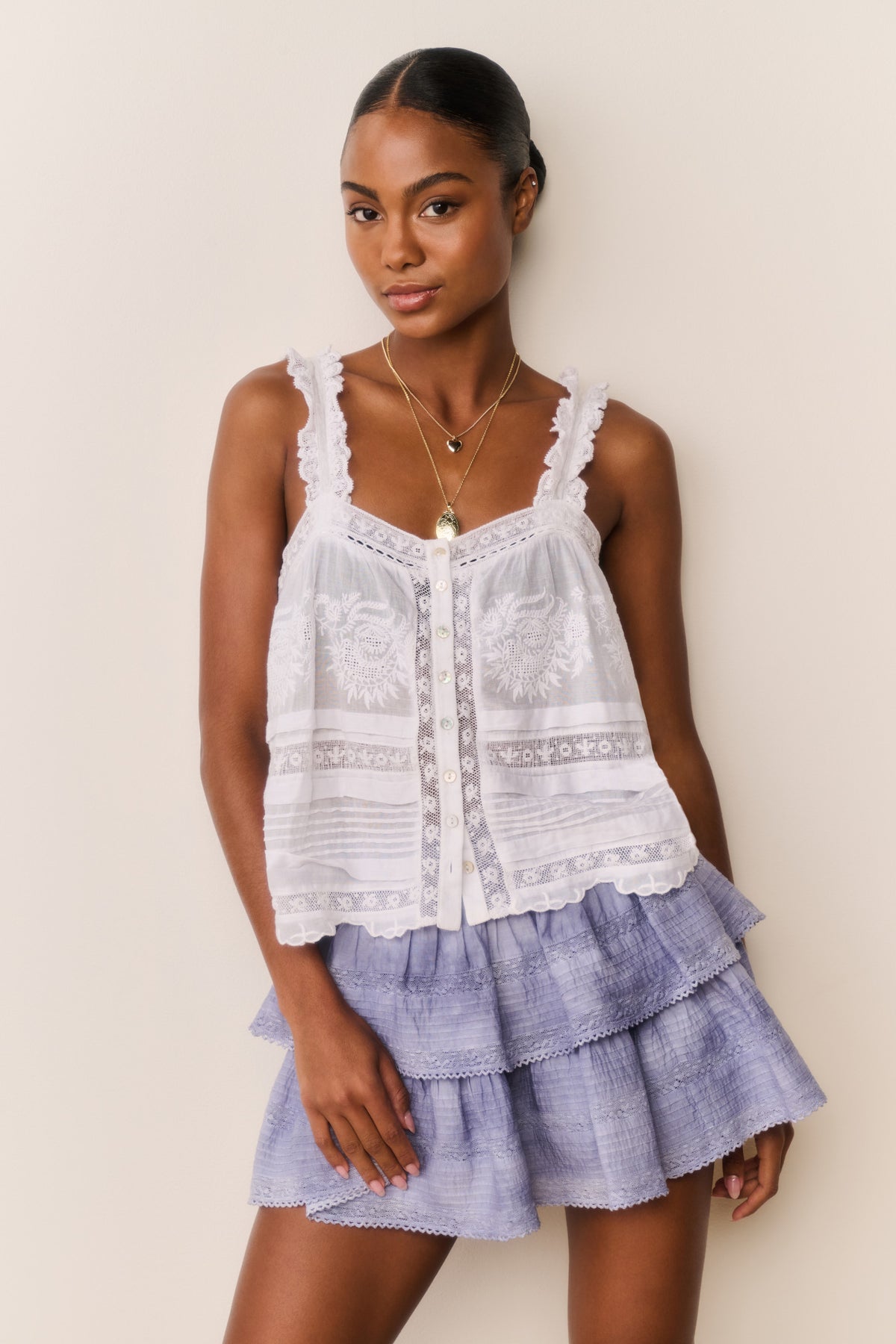 Tiered ruffle mini skirt in indigo ice blue dye, front view with slight angle