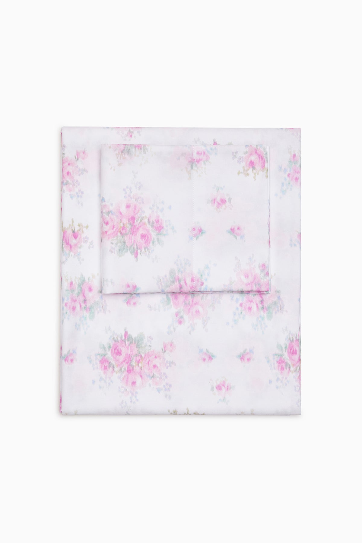 Pink floral sheet set folded flat, includes flat sheet and pillowcases