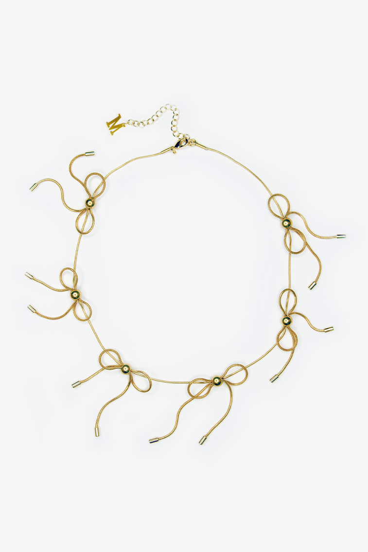 Gold bow necklace with small ribbon bow pendants on a chain