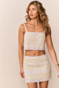 Lemon cotton Victorian mini skirt featuring layered lace trims and tie ribbon