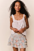 Layered ruffle mini skirt with light sky blue base and peony floral print