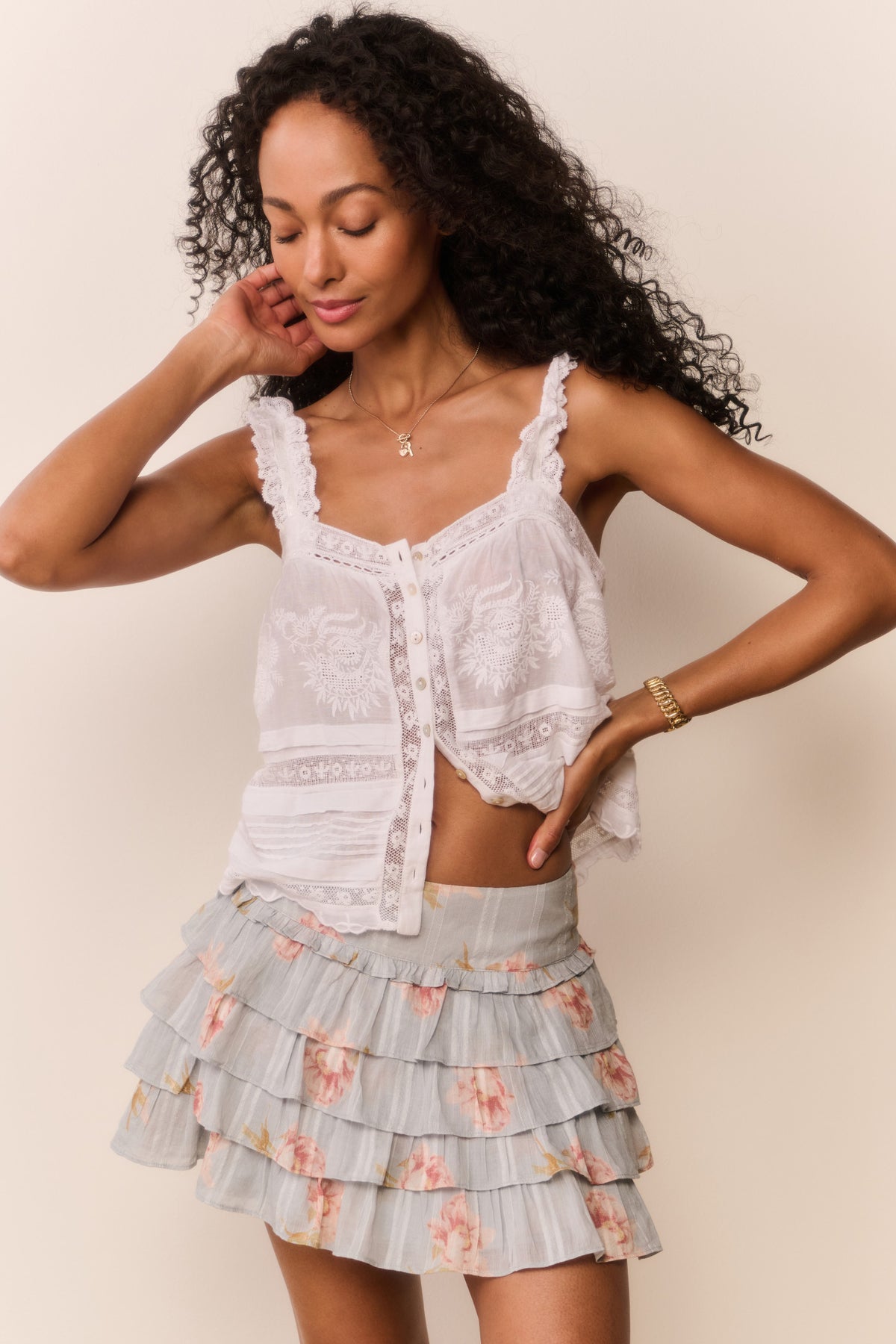 Cotton mini skirt with tiered ruffles and peony print on light sky blue