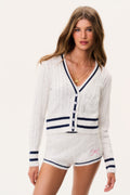Ivory cable-knit V-neck cardigan with navy button front and stripe cuffs