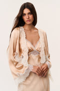 Silk-blend top with lace inset V-neck and long sleeves; tied front detail