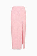 Pink crepe midi skirt with front slit and scalloped hem, tiny print