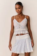 Floral cotton mini skirt with elastic waist, layered tiers and scalloped lace edge
