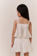 Girls' white cotton sleeveless top with lace straps and ruffled back