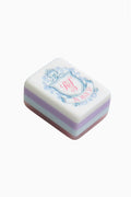Single pastel mahjong tile with blue floral ornament and decorative medallion