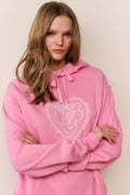 Pink fleece hoodie with heart lace-style applique, front pouch pocket, drawstring hood