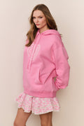 Pink fleece hoodie with heart applique on front, pullover hood, long sleeves