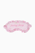 Pink ruffled eye mask with 'feeling fancy' print and elastic straps