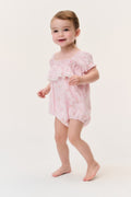 Baby ditsy floral pinafore romper in light pink with tiered ruffle shoulders