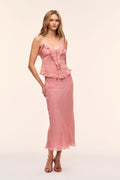 Blush pink silk Swiss dot midi skirt with decorative ruffle overlay