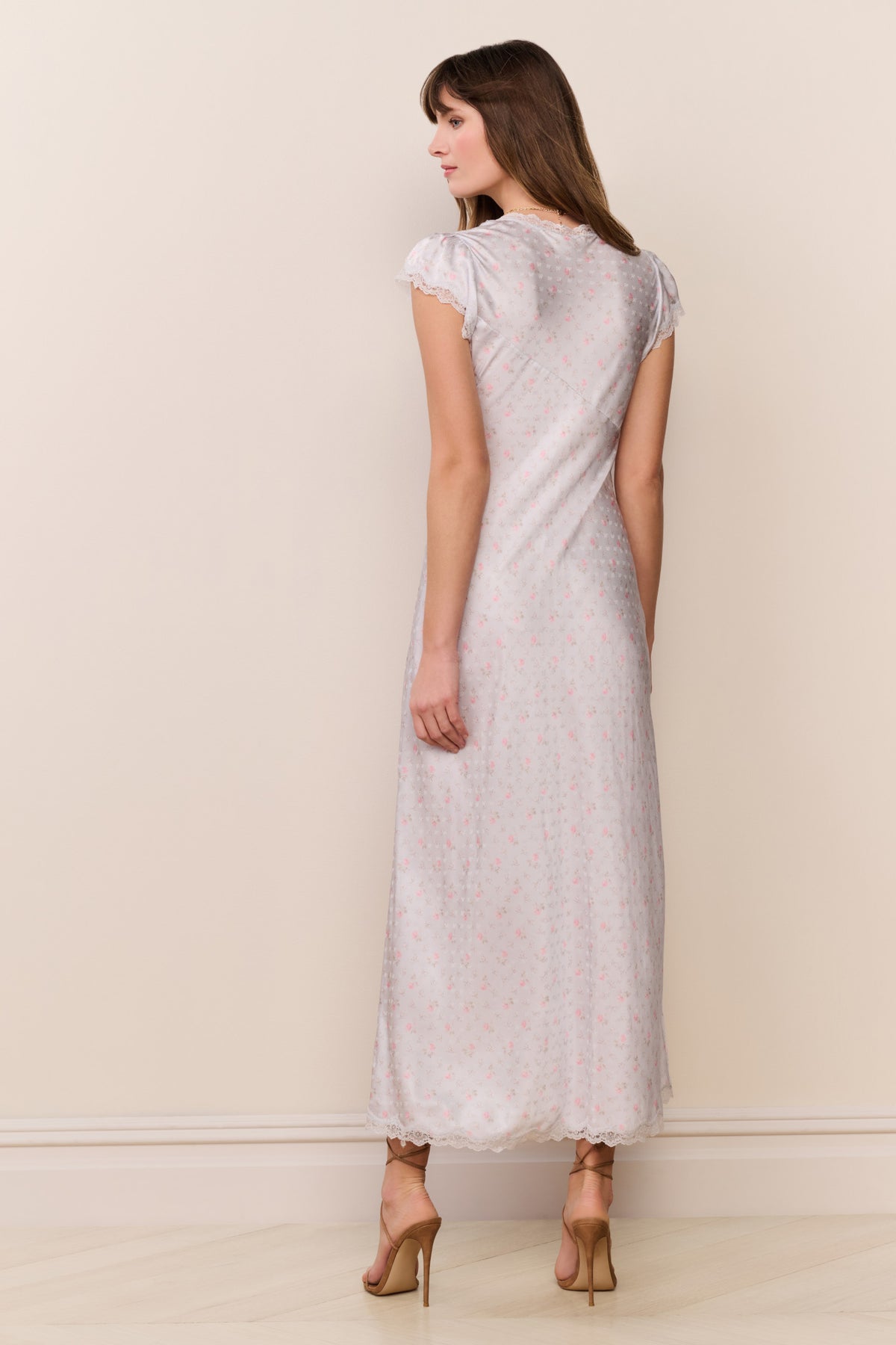 Light blue floral maxi dress with cap sleeves, V-back, and lace-trim hem
